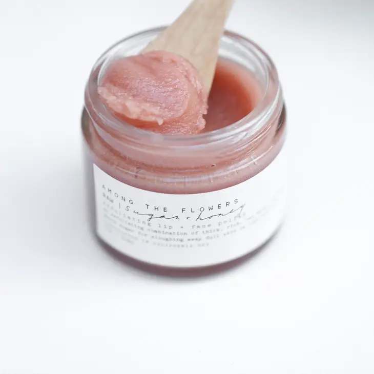 Honey and Sugar Exfoliating Lip Face Polish Honey and Sugar Exfoliating Lip Face Polish - An important step to balanced skin health is exfoliation. Used once a week, this formula has been carefully alchemized to gently slough away dead cells, debris, and smoothes the surface of the skin without irritating. With an oil-free base, it will not clog pores. The raw honey actually goes to work by naturally protecting against unwanted bacteria and microbial development. 2 oz. INGREDIENTS: Raw unrefined local honey, sugar, rose clay, lemon essential oil