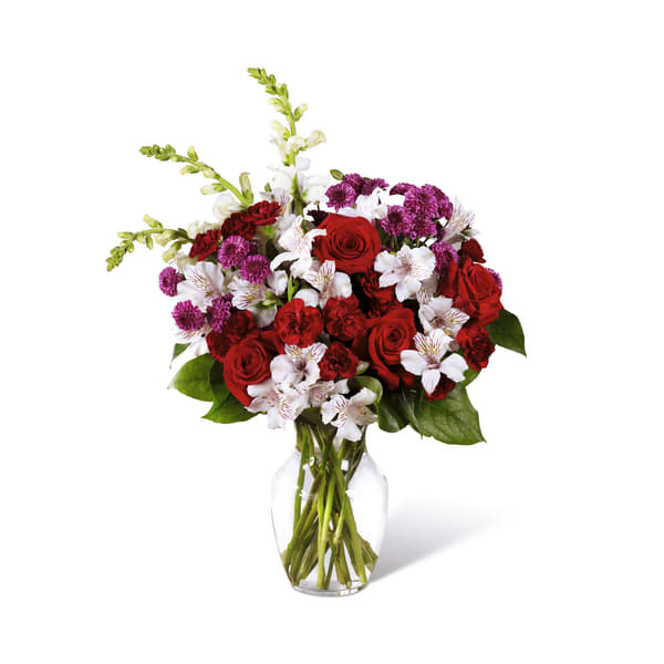 Dramatic Effects - An arrangement with snapdragons, red roses, mini carnations, alstroemerias and purple mums 
