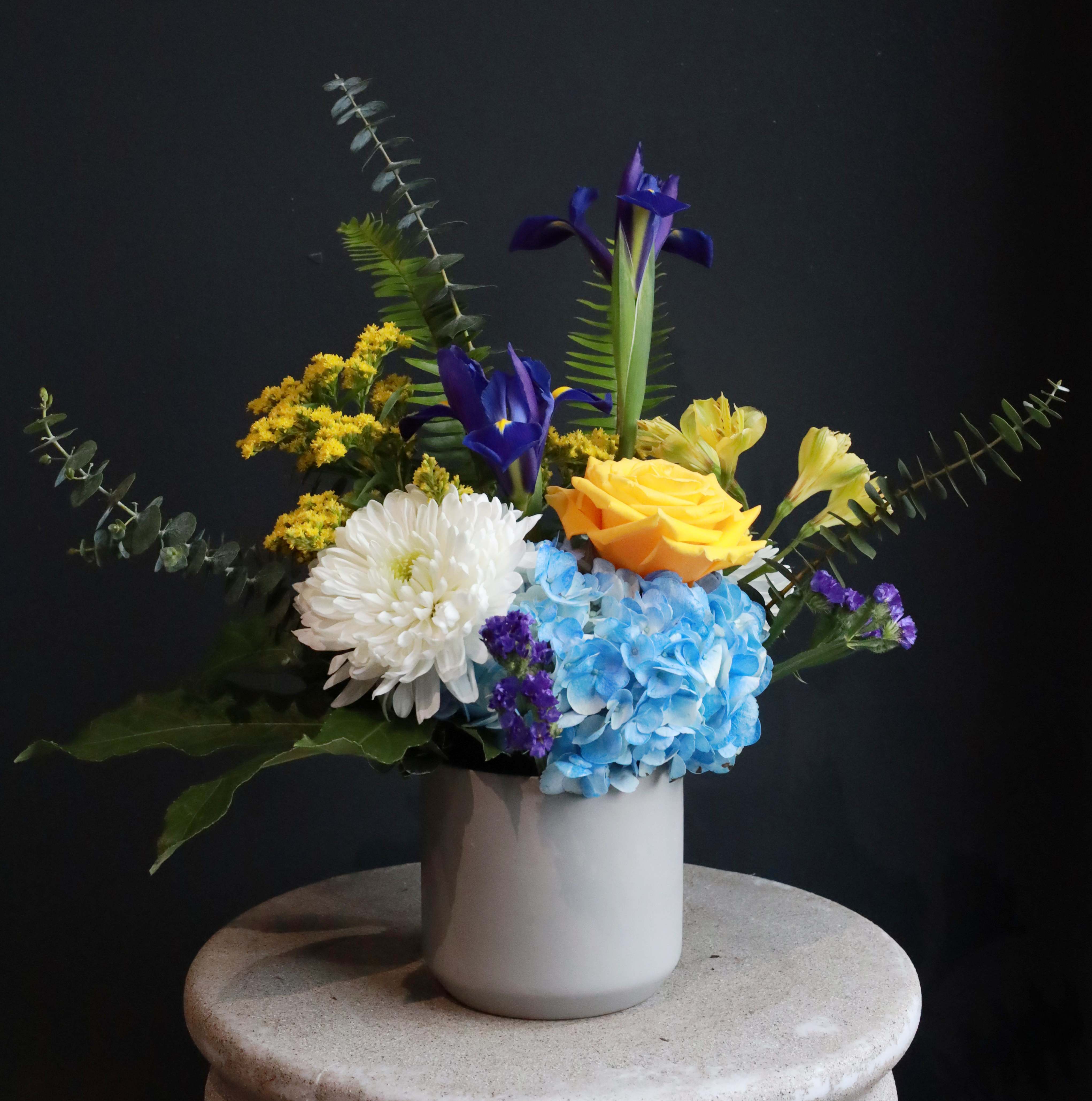Glowing Memories - Be a light to someone during a hard time with this lovely arrangement of yellows and blues.