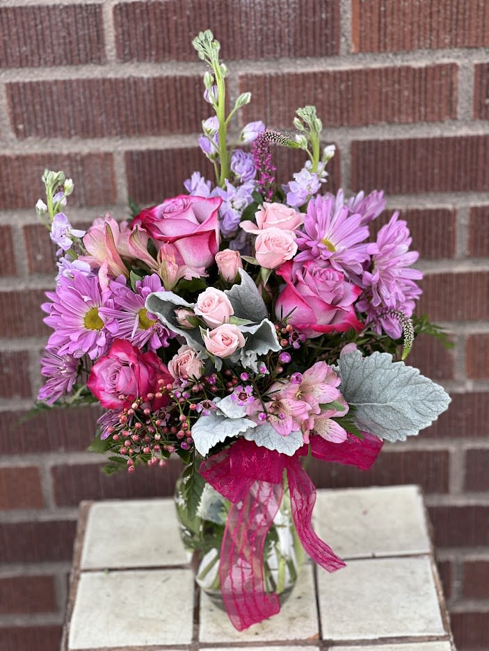 Jumping for Joy - Someone you know (or want to know!) will jump for joy when she receives this charming bouquet. Soft and feminine colors, flowers and textures are all wrapped up in one pretty package. Product ID: T48-1A 