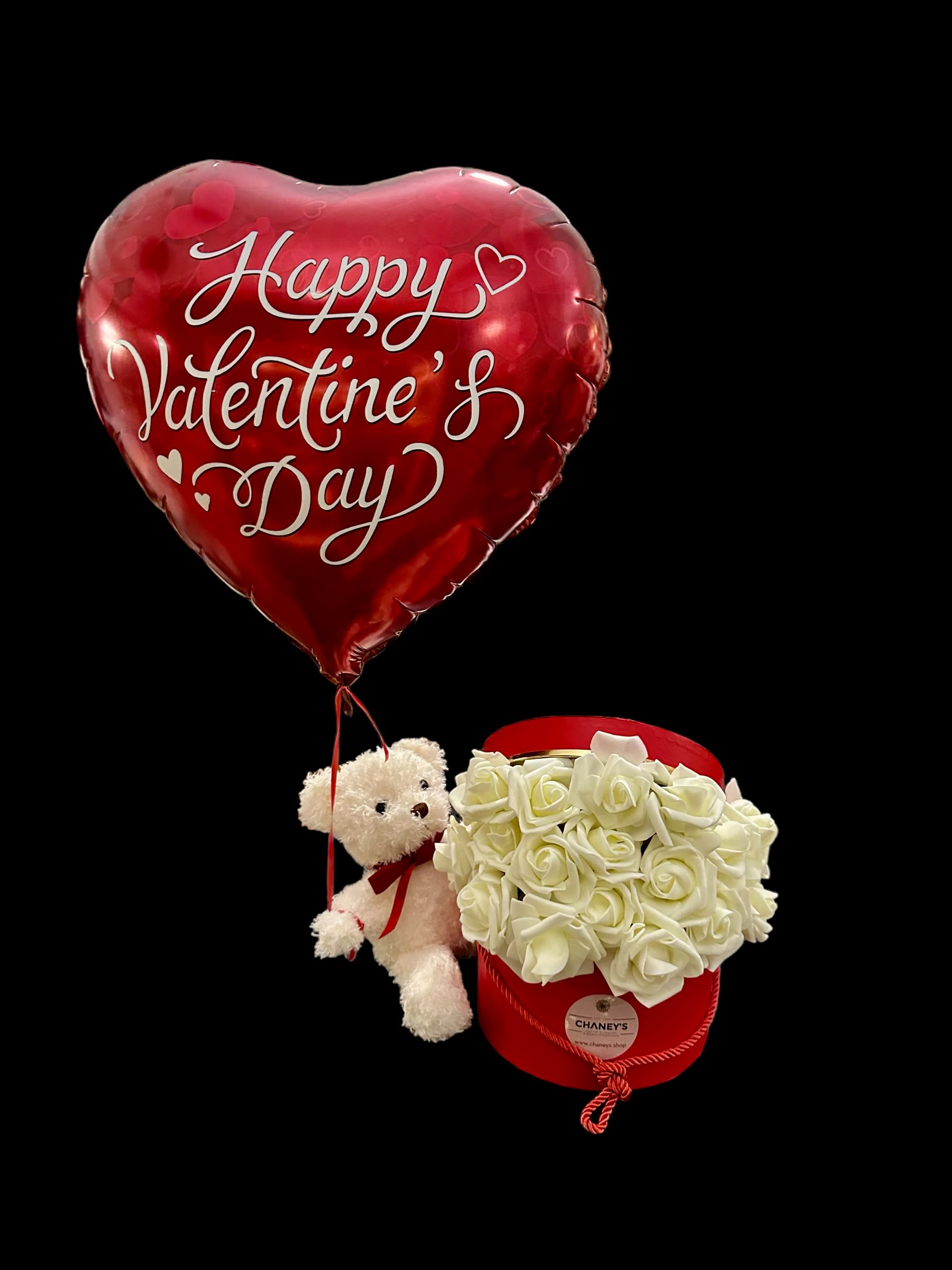 Chaney´s Valentine Teddy Box with Artificial White Roses - It's Valentine Season! Fall in love with this beautiful designed box of 20 artificial white roses. Everlasting blooms for everlasting memories! 18&quot; balloon heart and Teddy as add on included!