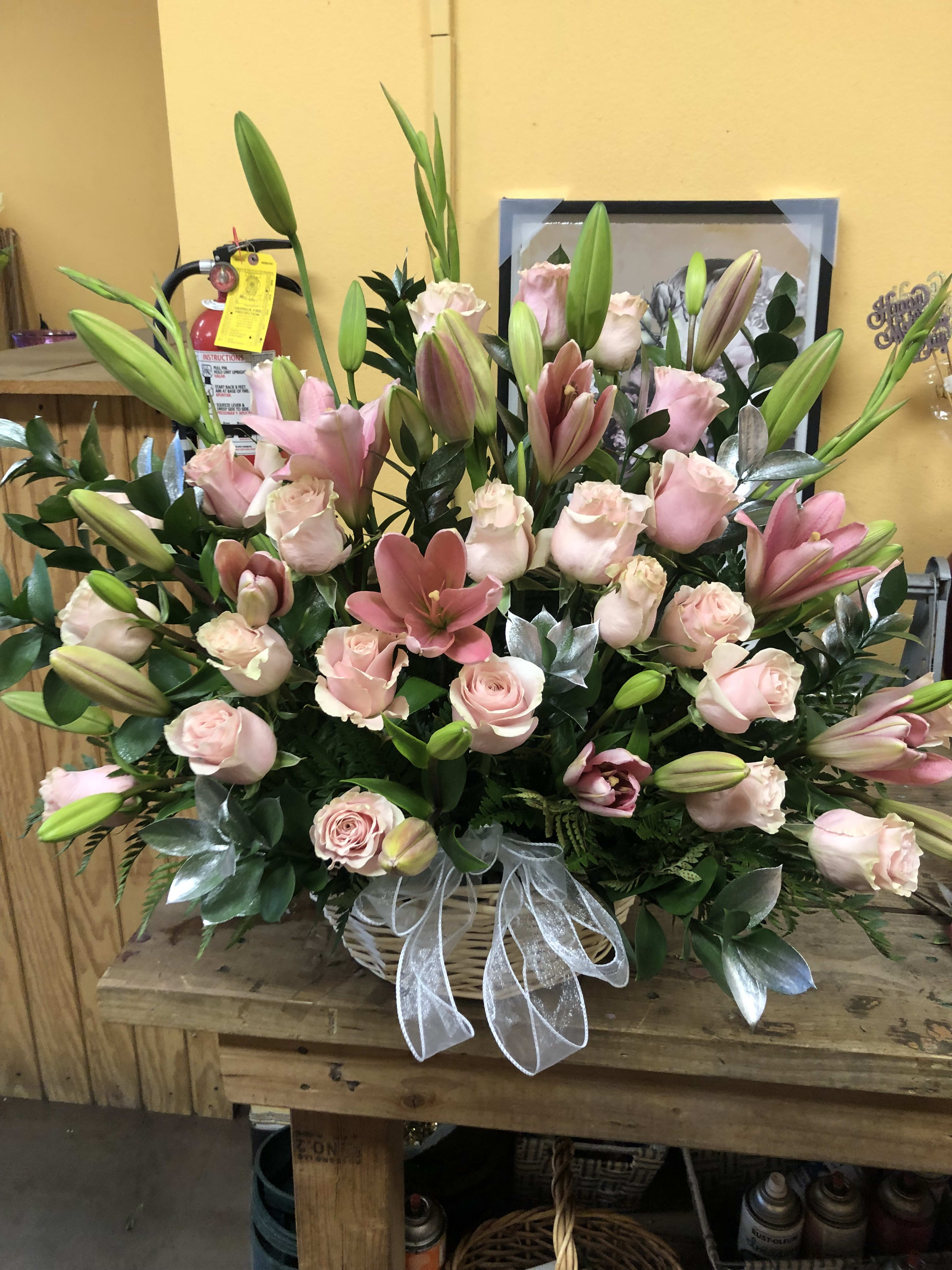 Pink Heavenly Basket  - 24 Pink Roses, Gladiolas, and lilies with a touch of silver ruscus leaves in a basket.