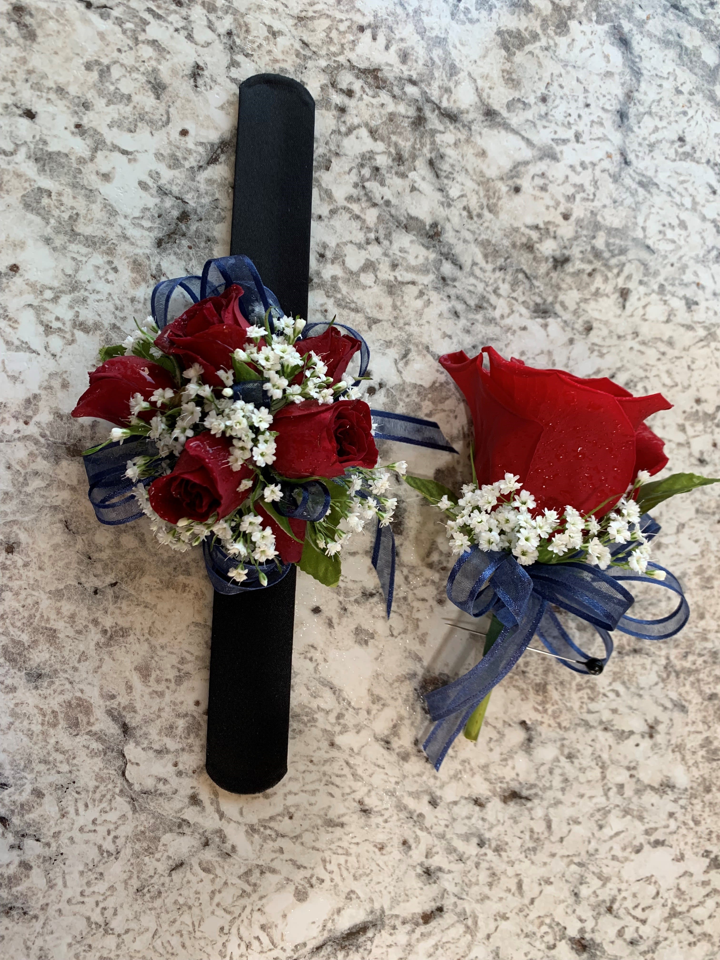 Red Rose Corsage and Boutonniere Set - This beautiful red rose corsage and boutonniere set can be customized for your perfect prom night! These can be purchased separately, $29.99 for the corsage and $9.99 for the boutonniere.