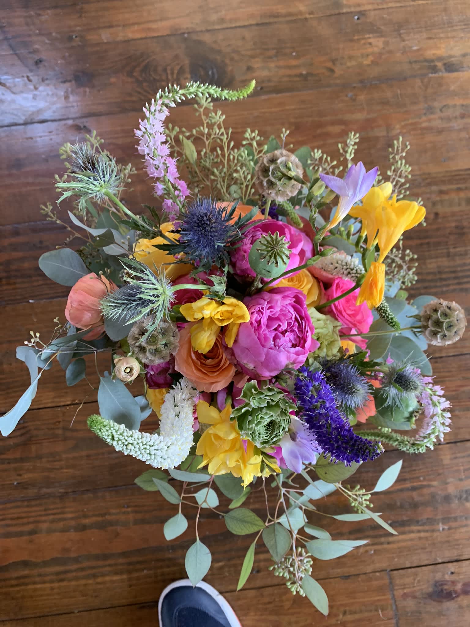 the &quot;Ali&quot; - This fun summer bouquet is bound to make anyone smile. The colorful bold blooms and whimsical look of the various pods combine to create a truly bright collection that reflect a joyful and playful spirit.  *All bouquets can also be arranged in vases or containers