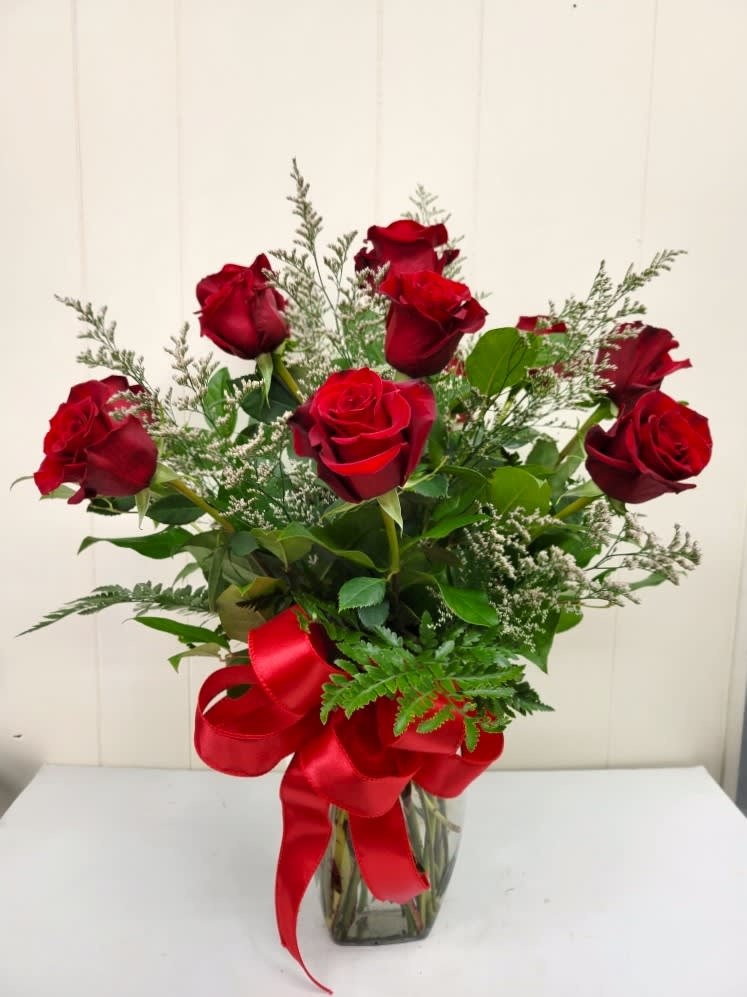 Modern Dozen Roses - A modern twist on a classic! A dozen roses with limonium and a bow.