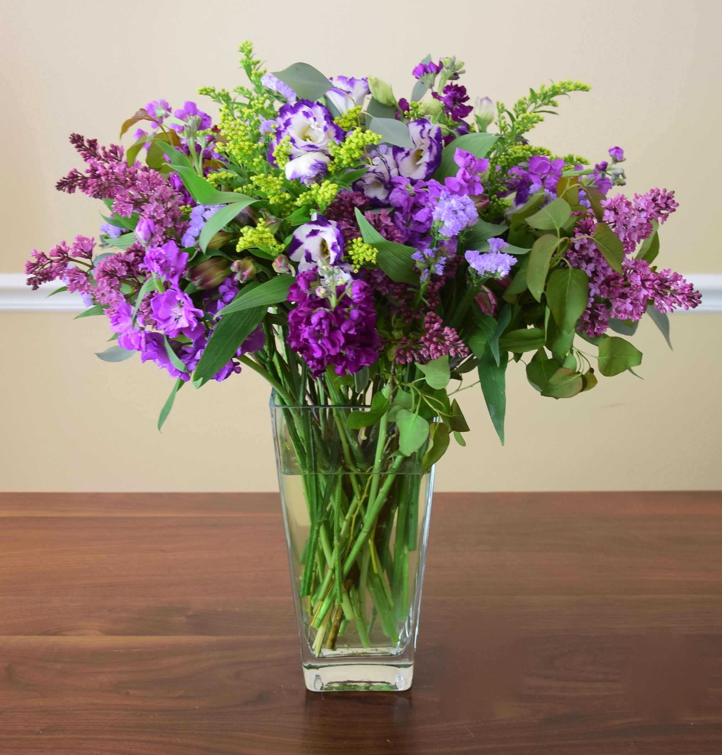 Lovely Lilac  - Beautiful arrangement featuring market fresh purple and lavender flowers carefully designed in a vase.