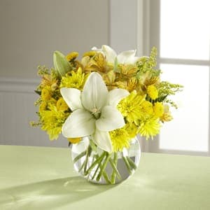 The FTD® Your Day™ Bouquet -  Make today their special day, lit with sun-kissed blooms and happy surprises. White Asiatic Lilies stretch their clean star-shaped petals across a bed of yellow Peruvian Lilies, chrysanthemums, button poms, and solidago accented with lush greens presented in a clear glass bubble bowl vase to create a flower bouquet blooming with warm wishes at every turn. A memorable thank you, birthday, or get well gift! GOOD bouquet includes 13 stems. Approx. 9&quot;H x 10&quot;W. BETTER bouquet includes 17 stems. Approx. 10&quot;H x 11&quot;W. BEST bouquet includes 19 stems. Approx. 14&quot;H x 14&quot;W. 