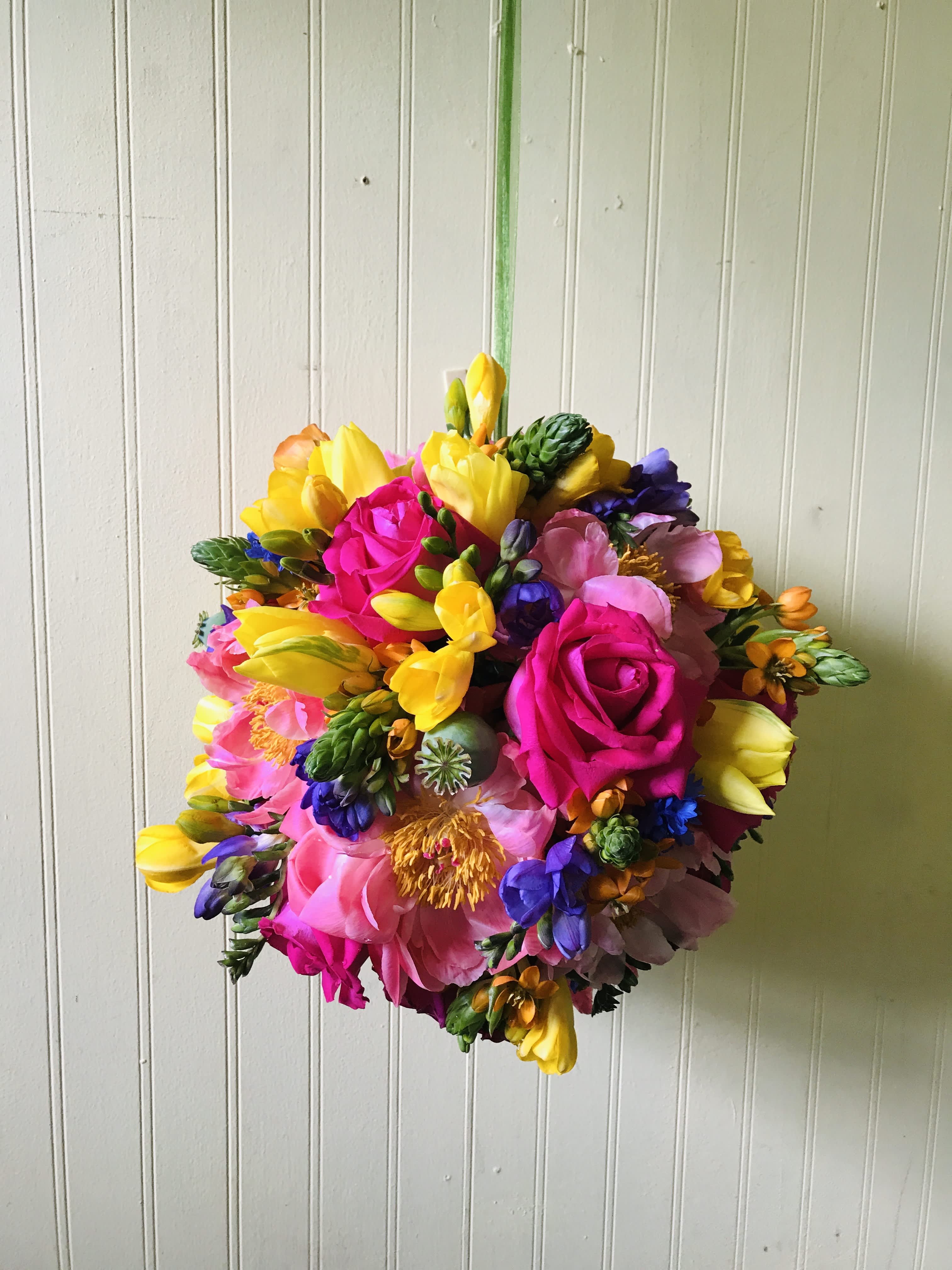 Flower Sphere - This unique and fun design is perfect for prom, a party, or just to hang in your home. The sphere shape really shows off the blooms from every angle and will add radiant color to any home or event! *Deluxe Sphere 10&quot; *Premium Sphere 12&quot; 