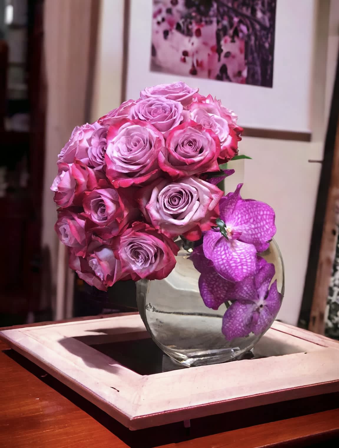 Pink halfmoon - Flower : Purple roses bouquet with pink Vanda orchids  Vase : H8 : W 9 half moon clear vase