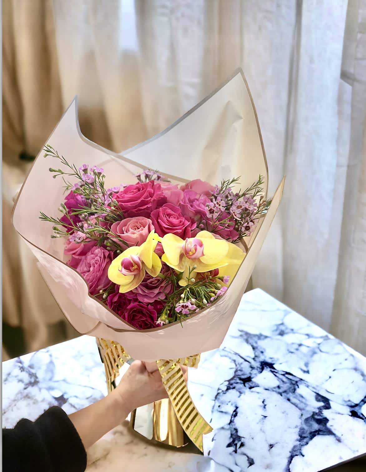 Beautiful pink bouquet Beautiful pink bouquet - Flower : Shades of hot pink, light pink roses with wax flower, with touch of yellow orchid