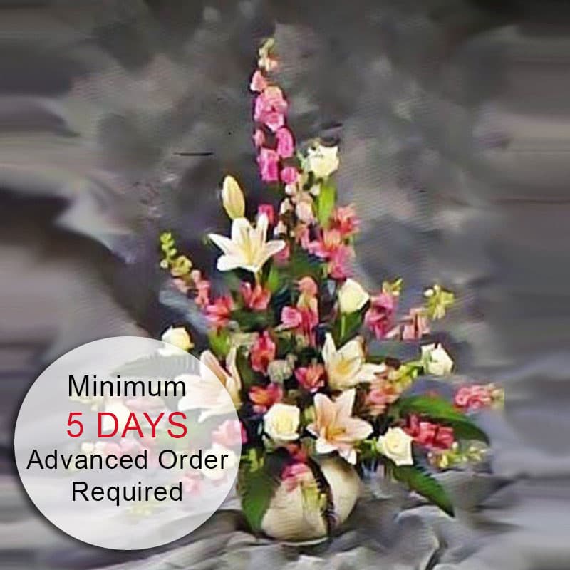 Watanabe Gentle Spirit - MINIMUM OF 5 DAYS ADVANCED NOTICE REQUIRED to ensure that the flowers can be properly staged for quality results. A delicate arrangement that is sure to make service attendants smile in remembrance of a Gentle Spirit (Starting from 30&quot;H).