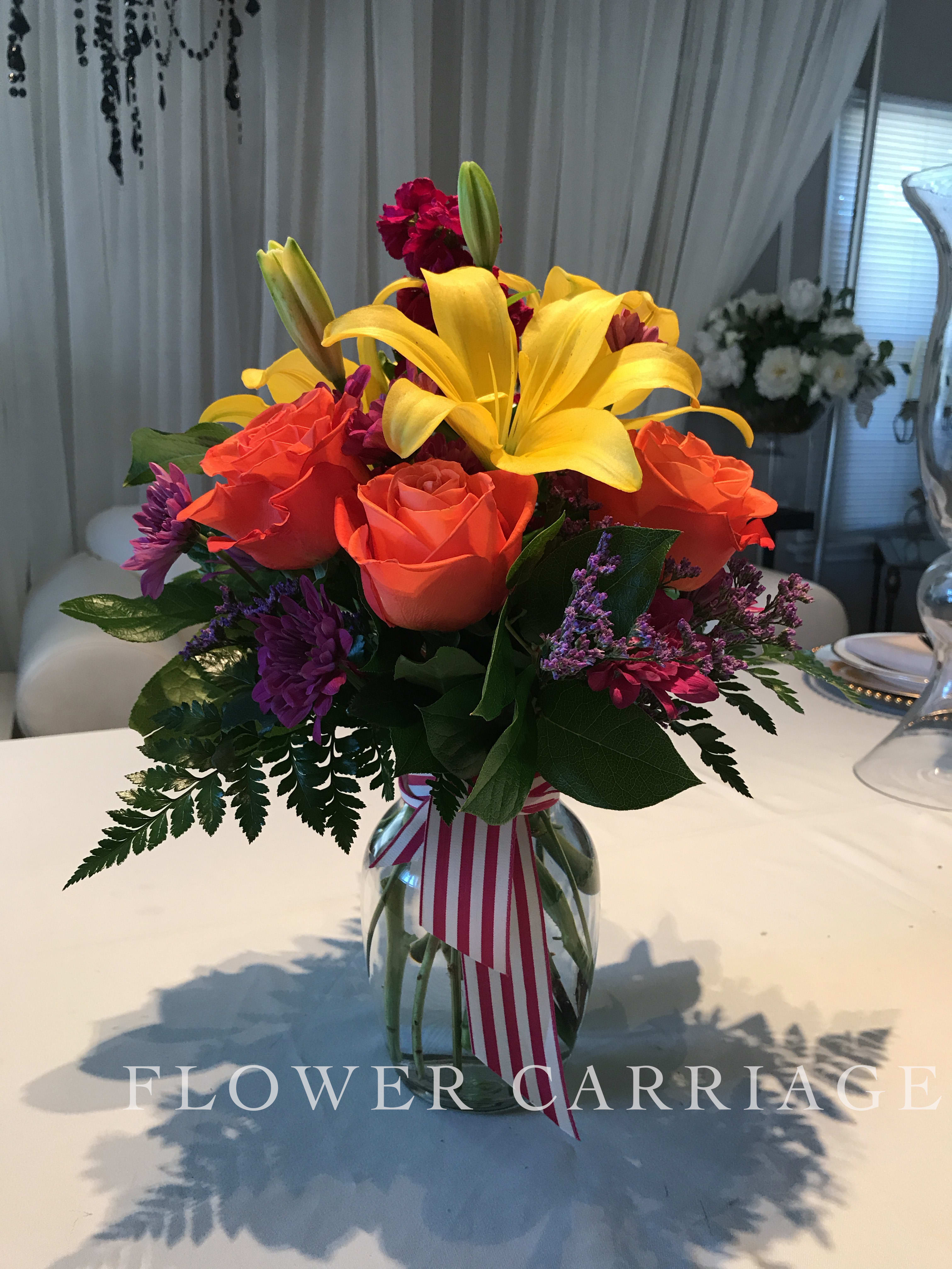 Brightest Smile By Flower Carriage  - The brightest the biggest smile you will get, with this beautiful bouquet. Lilies, Ecuadorian Roses, Stock and Misty. 