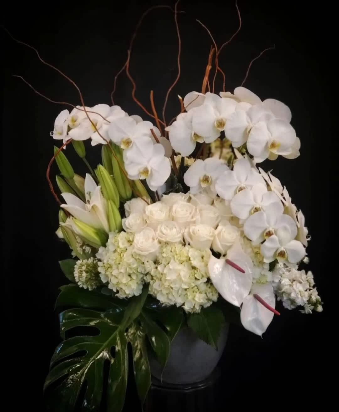 Luxury design Four - Luxury design - All luxury designs are designed by our talented team no two arrangements are ever exactly the same. We will always fill the order to the value provided. The amount provided will go toward design, flowers chosen and the container. This design is great for grand openings, corporates birthday party's special events and weddings.     Now just enjoy the flowers. Wow them with these amazing designs and let our designers do the rest. PLEASE ORDER IN ADVANCE TO ENSURE TIME TO PREPARE FOR THIS BEAUTIFUL PIECE OF ART.  