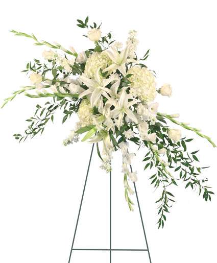 TRANQUIL TEARS STANDING SPRAY  - Celebrate the dazzling life of a loved one with a classy floral spray that brings their calming spirit to life. The Tranquil Tears standing spray is an elegant addition to any funeral service, memorial service, or wake while showcasing your deepest sympathies to the family and friends as they mourn during this time. Tranquil Tears features traditional white lilies with more modern white hydrangeas atop a sea of ruscus, bringing soothing beauty to this time of sorrow. 