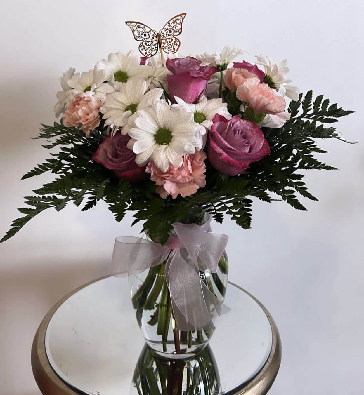 Delight Vase Special - Flowers may have to be substituted.. But you should recieve the same overall color and theme. 