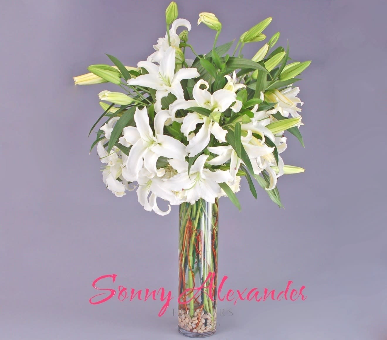 Queen Casablanca - Fill the air with the aroma of fresh fragrant lilies.  Measures approximately 3 feet tall by 30 inches in diameter.