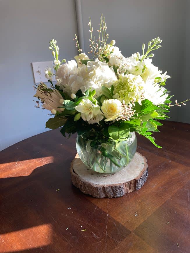 sweet thoughts - almost all white flowers  to incllude: fugi, roses, carns,hydrangeas and more