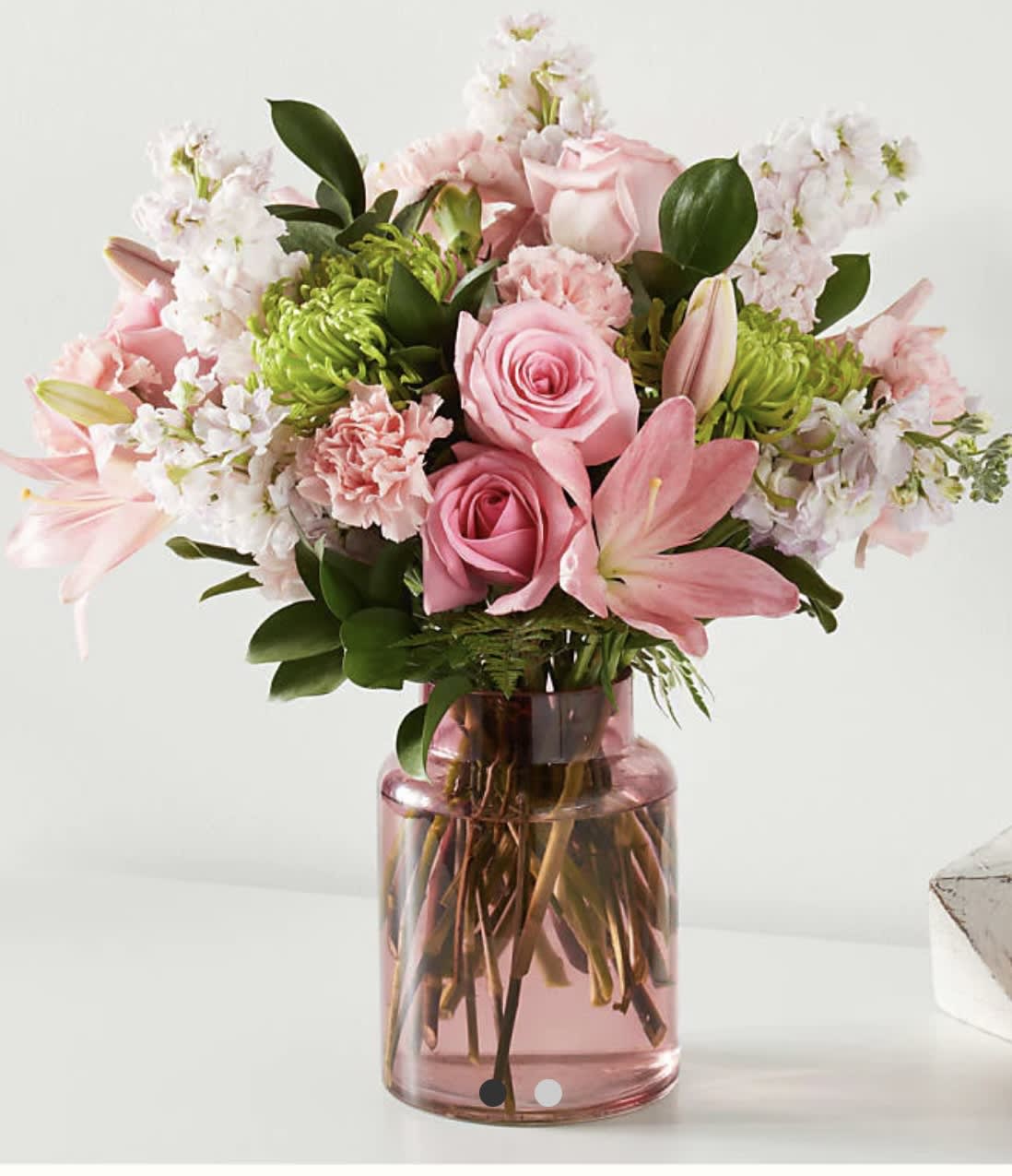 Pretty in Pink (F) - Make Moms day with this delicately gorgeous, softly pink hued bouquet in a matching blush vase.  Please Note: The bouquet pictured reflects our original design for this product. While we always try to follow the color palette, we may replace stems to deliver the freshest bouquet possible, and we may sometimes need to use a different vase. 