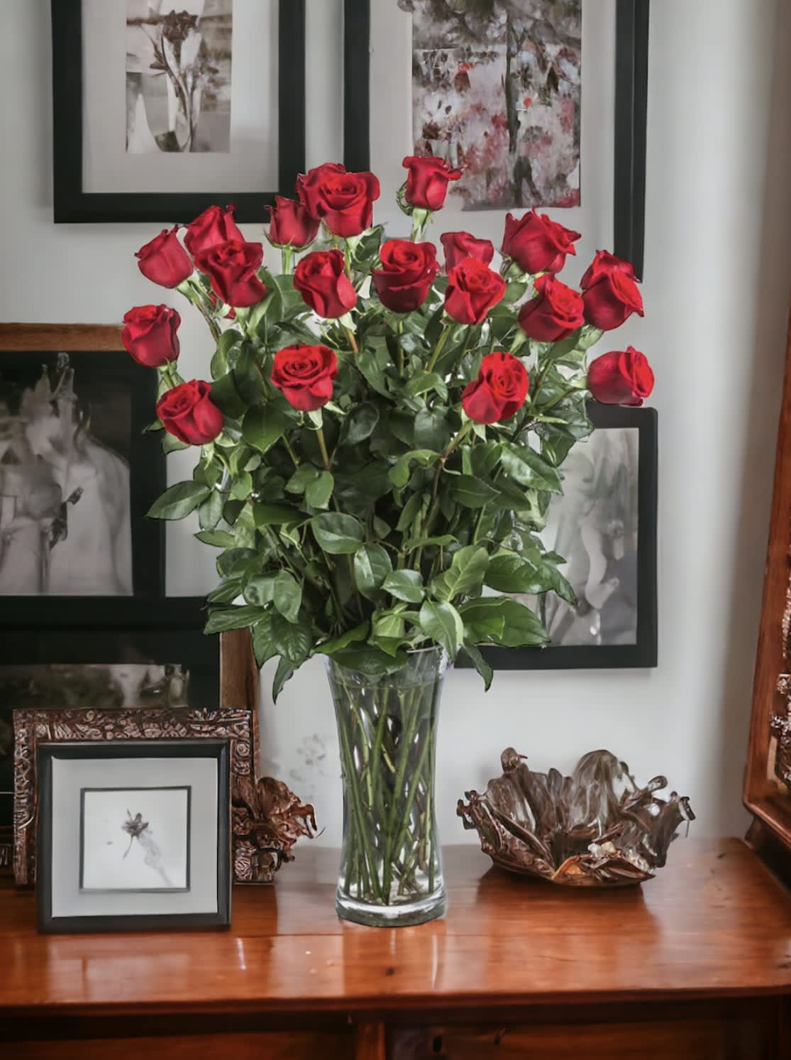 Two Dozen Long Stemmed Roses by BloomNation™ - These two dozen red roses provides the classic romantic gift. It's perfect for Valentine's Day or an Anniversary. APPROXIMATE DIMENSIONS: 30&quot; H X 22&quot; W