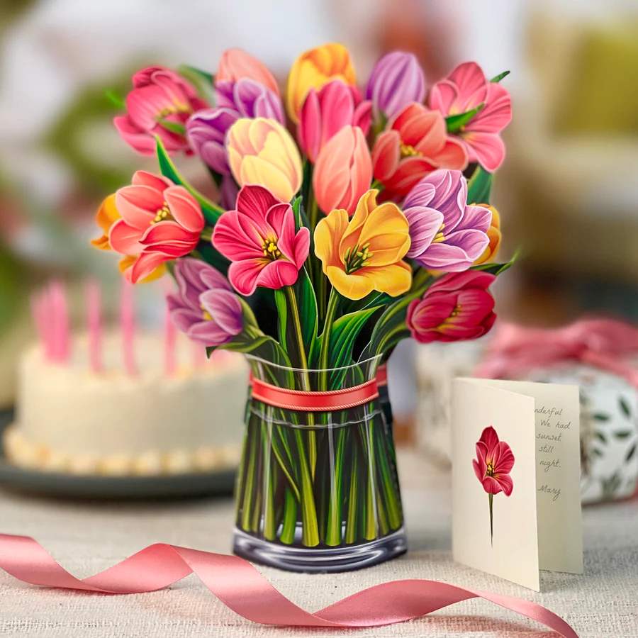 Festive Tulips Fresh Cut Paper Pop-Up Bouquet - Stunning paper floral bouquet pops open and brings color to any room. Note: card included- handwritten message upon request. No watering needed. Send some love!