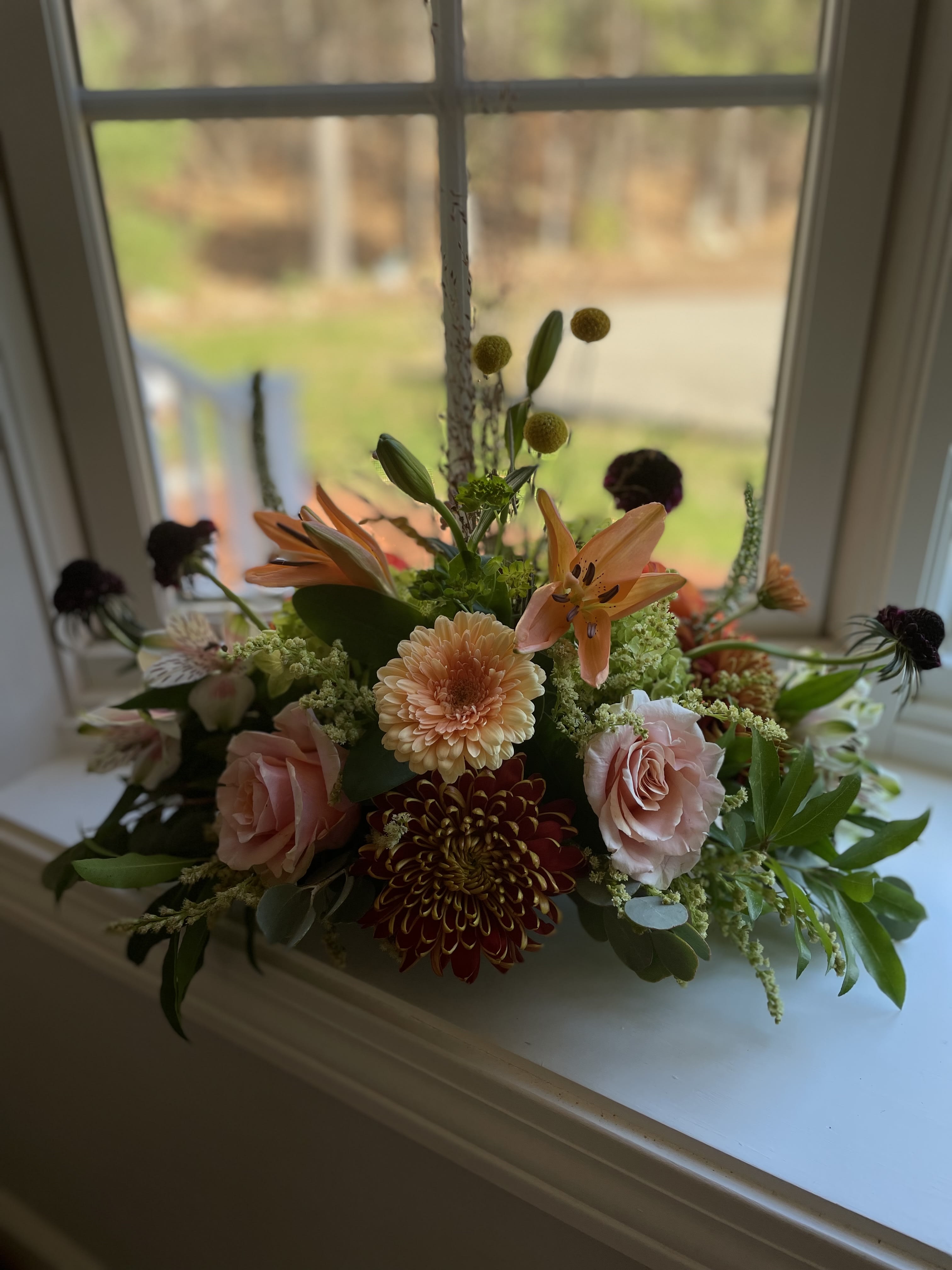 Garden style colorful centerpieces Garden style colorful centerpieces - Pretty arrangement for a beautifully set table Design is created with a garden theme