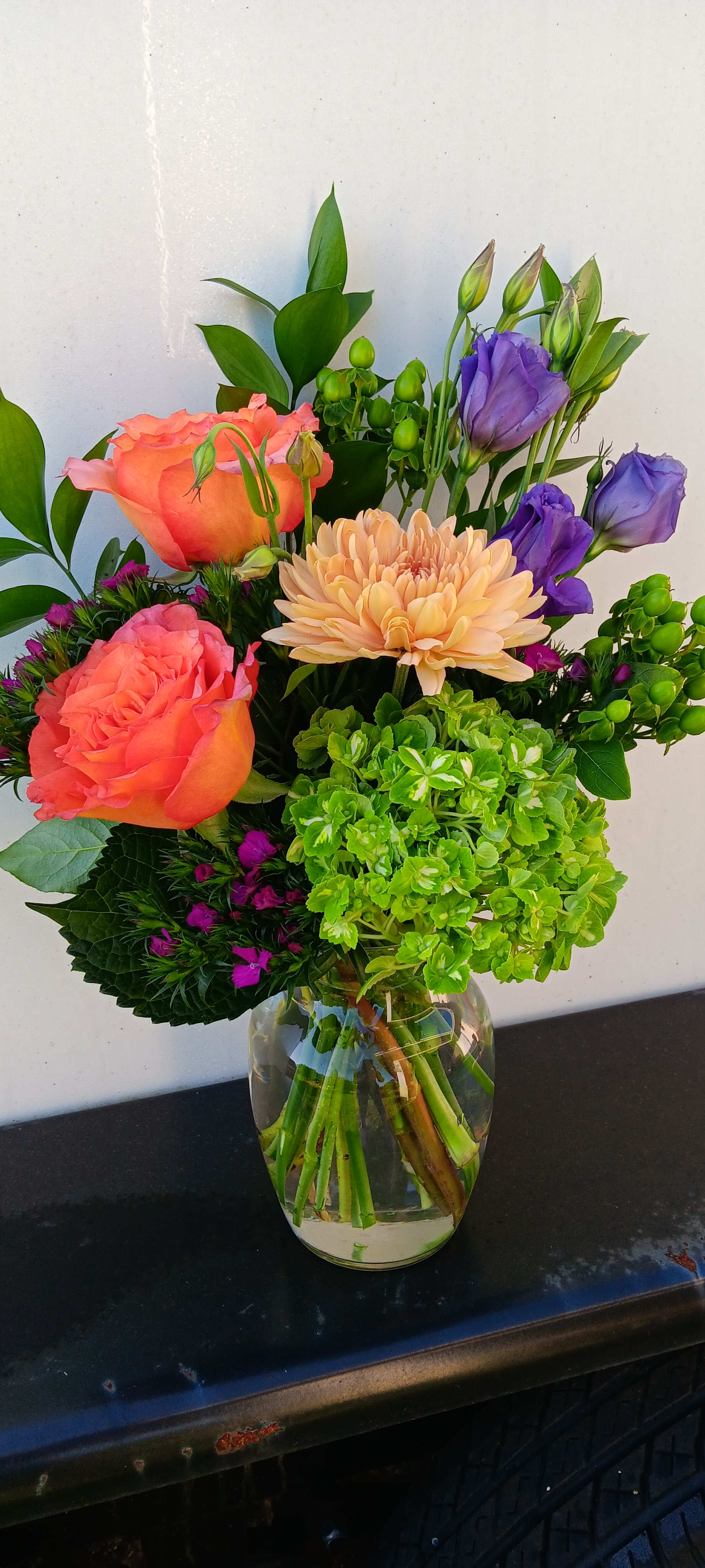 Sweet Surprise - An easy way to remind someone you care and are thinking about them. Brighten someone's day with this beautiful arrangement of hydrangea, roses, primrose and more.