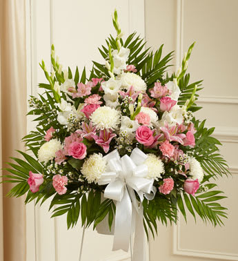 Heartfelt Sympathies Pink &amp; White Basket - It can be difficult to find the perfect way to express all the sympathy, care and concern you feel during times of sorrow. Artistically crafted by our expert florists using fresh, beautiful pink and white flowers, this standing basket arrangement is a heartfelt way to convey all the love and support you have in your heart. 