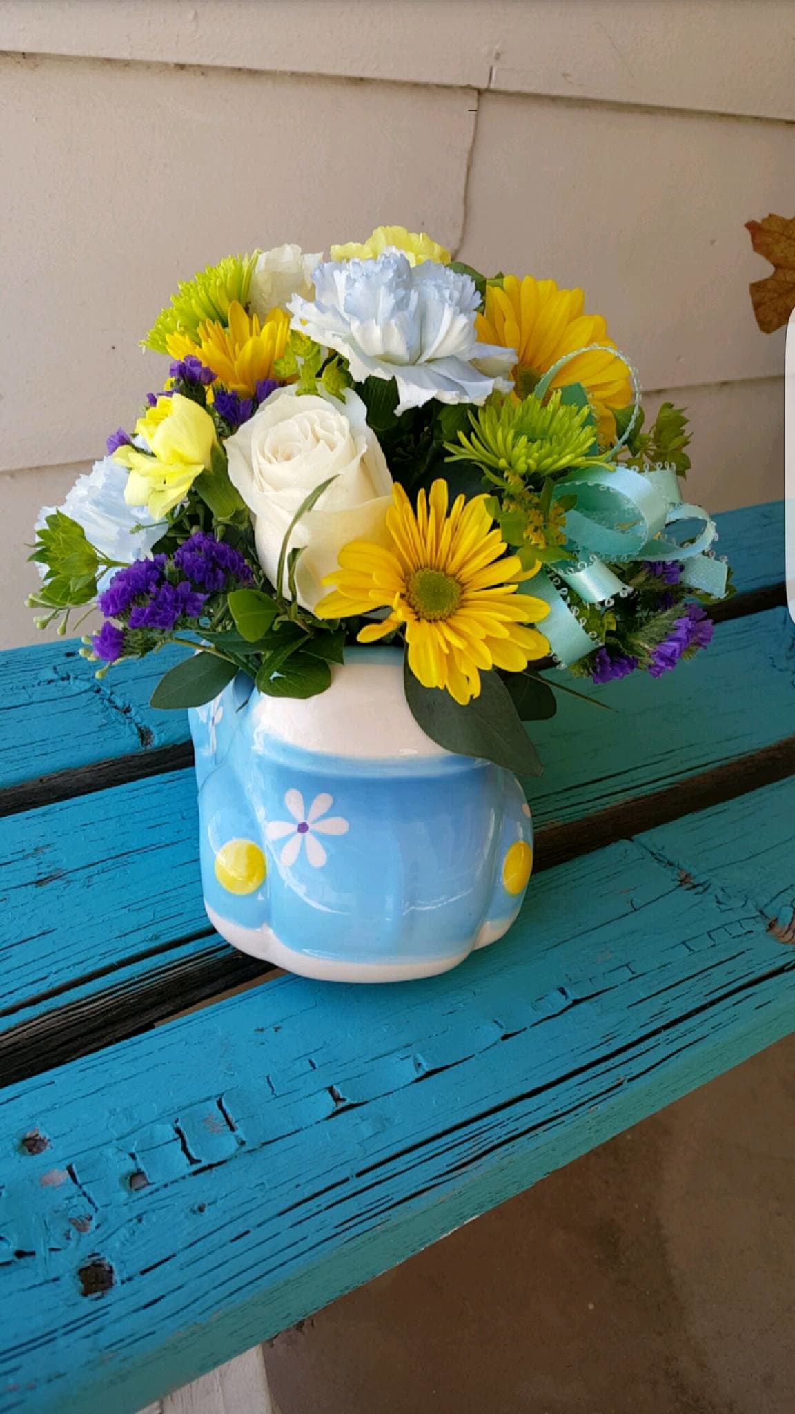 Blue Beetle Bug - Alstroemeria, Daisies, Baby's Breath, and Roses made in a Blue ceramic vase.  Great to celebrate the birth of a baby boy, birthday, or send it to your best friend!  