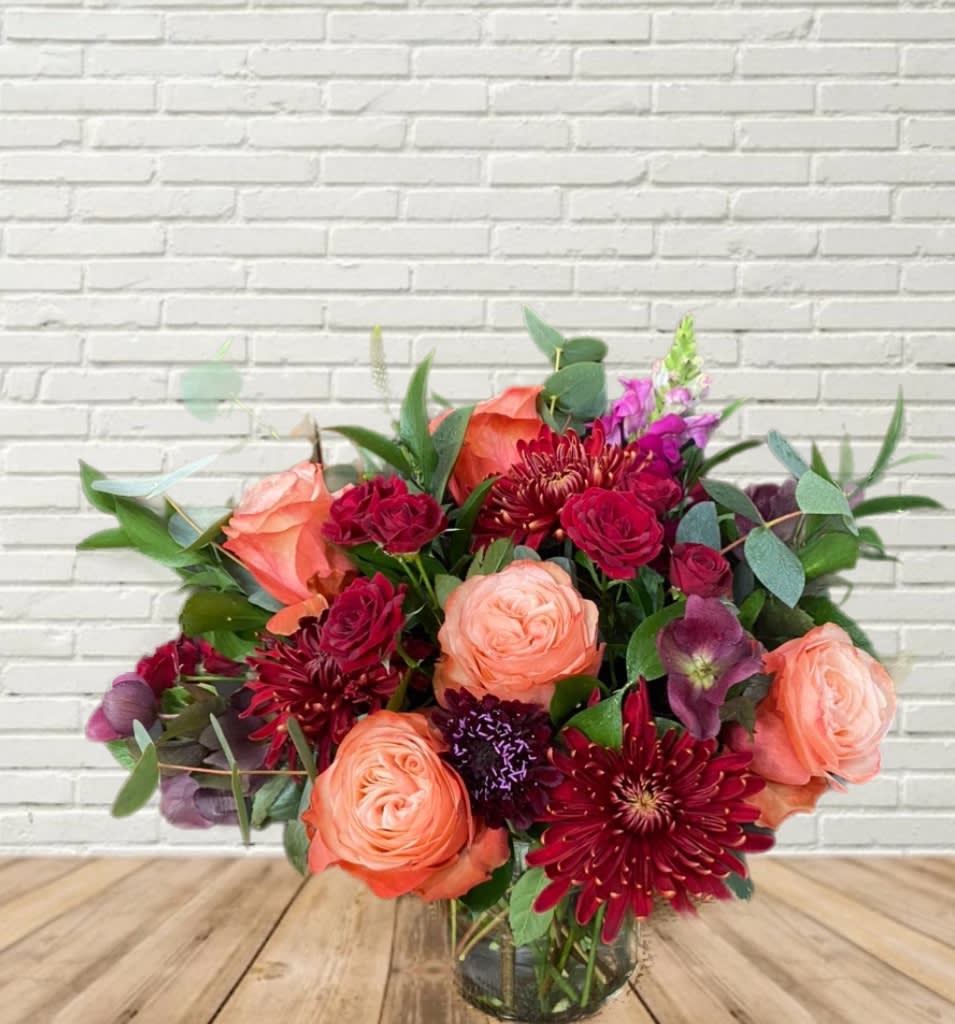 Cranberry Crush - A full cranberry tones fresh flower arrangement with rich reds, purples, and burnt pinks.
