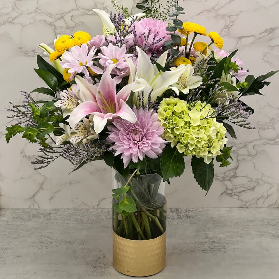 Spring celebration - A beautiful spring mixed bouquet with large lilies, green hydrangeas, alstroemerias, bright yellow button pompon and lavender chrysanthemums to light up your day 