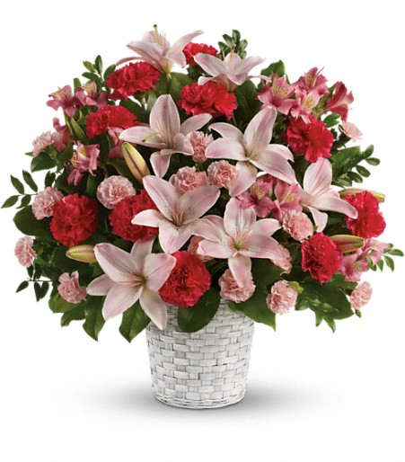 basket of Love  - this basket of love blends soft pastels and lively bold colors into a dazzling display of love and joy. Send this opulent arrangement to someone special as a grand gesture of your appreciation for them! A basket of Flowers, including Lilies, carnations and roses 