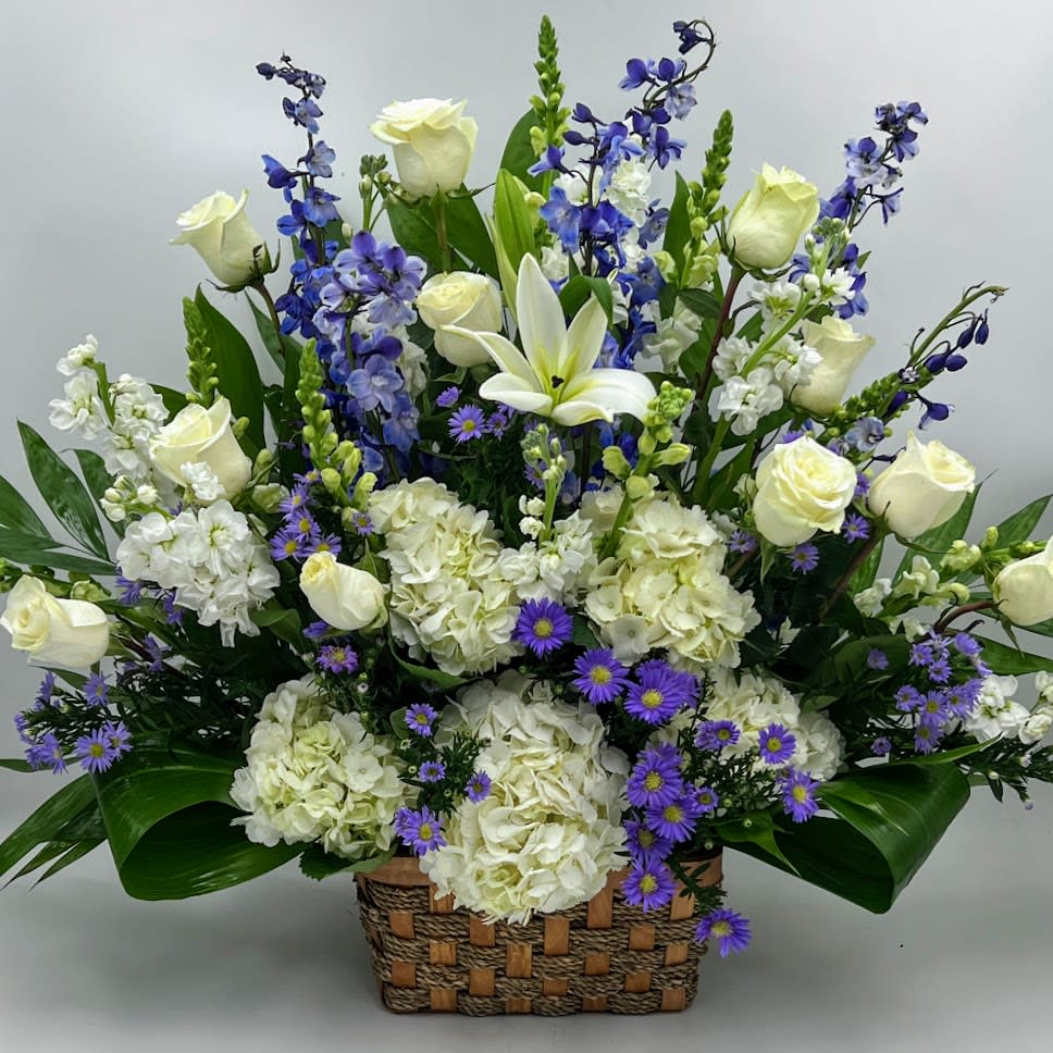 sky sky - a large eye-catching peaceful basket with white hydrangeas, lilies, roses, monte casino, lisianthus and roses.