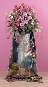 Memorial Tribute with Religious Tapestry SF52-21 - John Henry Sympathy Memorial Tribute with Religious Tapestry SF52-21 - John Henry Sympathy - SF52-21 This standing spray is full of lush blooms cascading above a religious tapestry. Tapestry is subject to change according to supply.