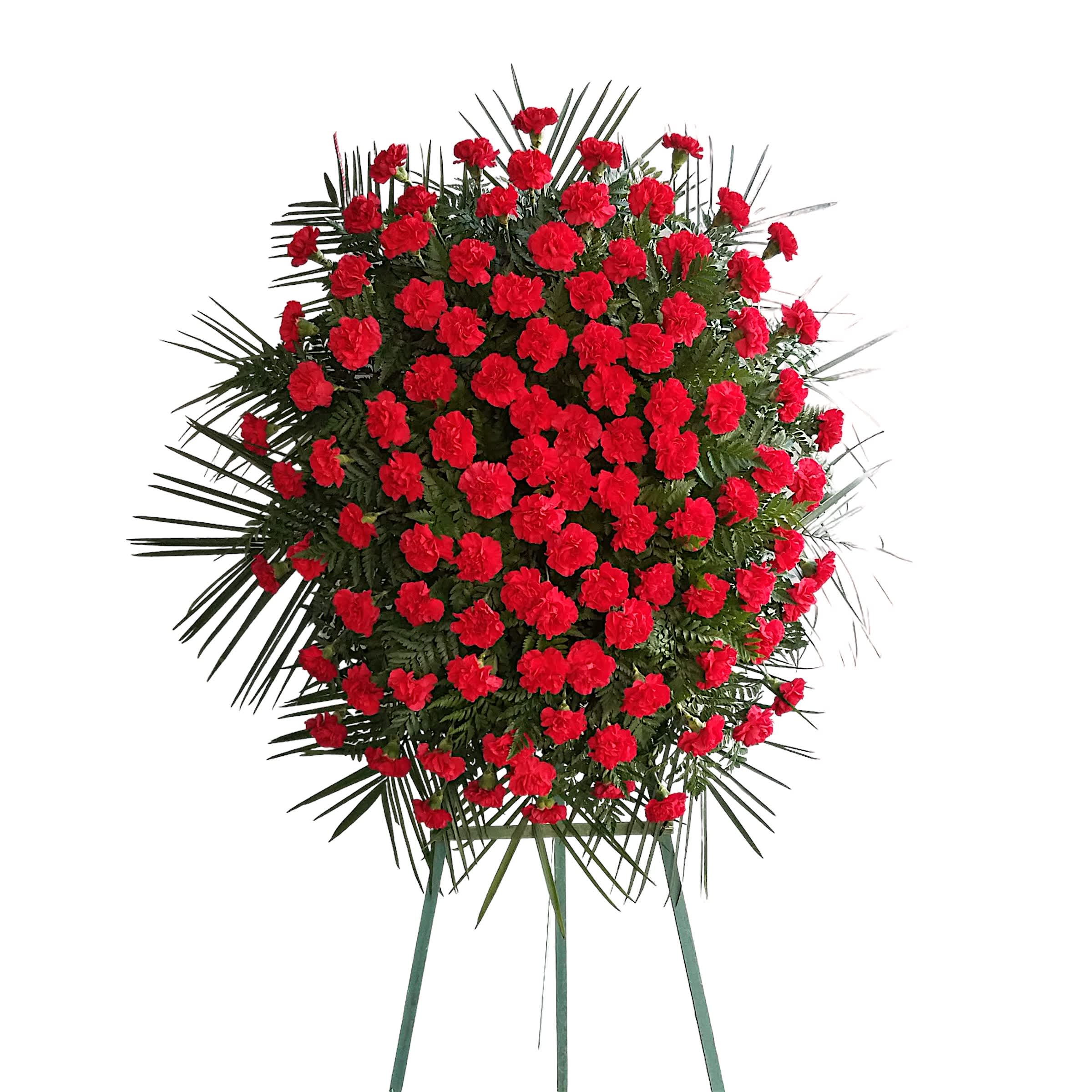 Gift of Warmth Spray - Bright and bold red carnations intricately placed to create a beautiful standing spray perfect for any service. his type of design is usually approximately 5 - 6 ft tall and is meant for funeral services ONLY. This design includes a free banner (please include a banner sign in the Special Instruction Box or Message Box with the title “BANNER”).  In the event a banner space is left blank for any reason, ONLY a card message will be included. Banners are printed in a black 2.5-inch wide ribbon with silver ink. Currently, we don't offer any other colors. If the service is the same day as the order was placed we cannot guarantee delivery by a certain time. And flowers will be delivered during normal business hours.  To ensure the delivered flowers match the displayed photo as close as possible we recommend ordering 3-5 days in advance. For the same or next day deliveries, we reserve a right to substitute flowers with the same or greater value.