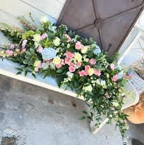 The Pastels Casket Piece  - All Pieces are customizable please let us know if there are other colors or flowers you would like to replace or change. 