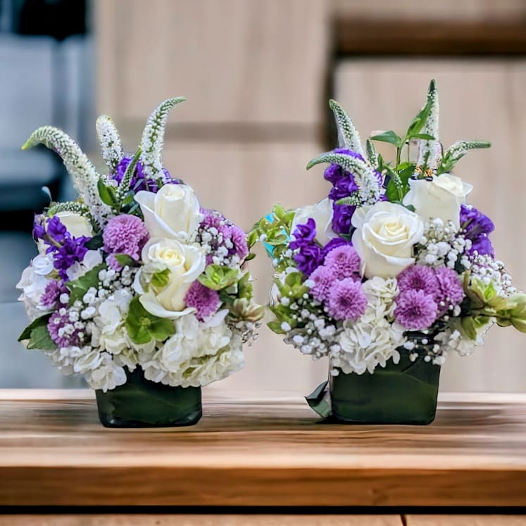 Spring Centerpieces - 2-4inch cubes with 3 white roses, hydrangea, veronica, lavender stock and button mums, accent flower and foliage