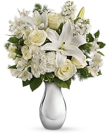 Teleflora's Shimmering White Bouquet Teleflora's Shimmering White Bouquet - All is calm all is white in this exquisite bouquet featuring white roses lilies alstroemeria and stock in a sparkling silver reflections vase. What a beautiful gift during this beautiful season. They'll be thrilled.