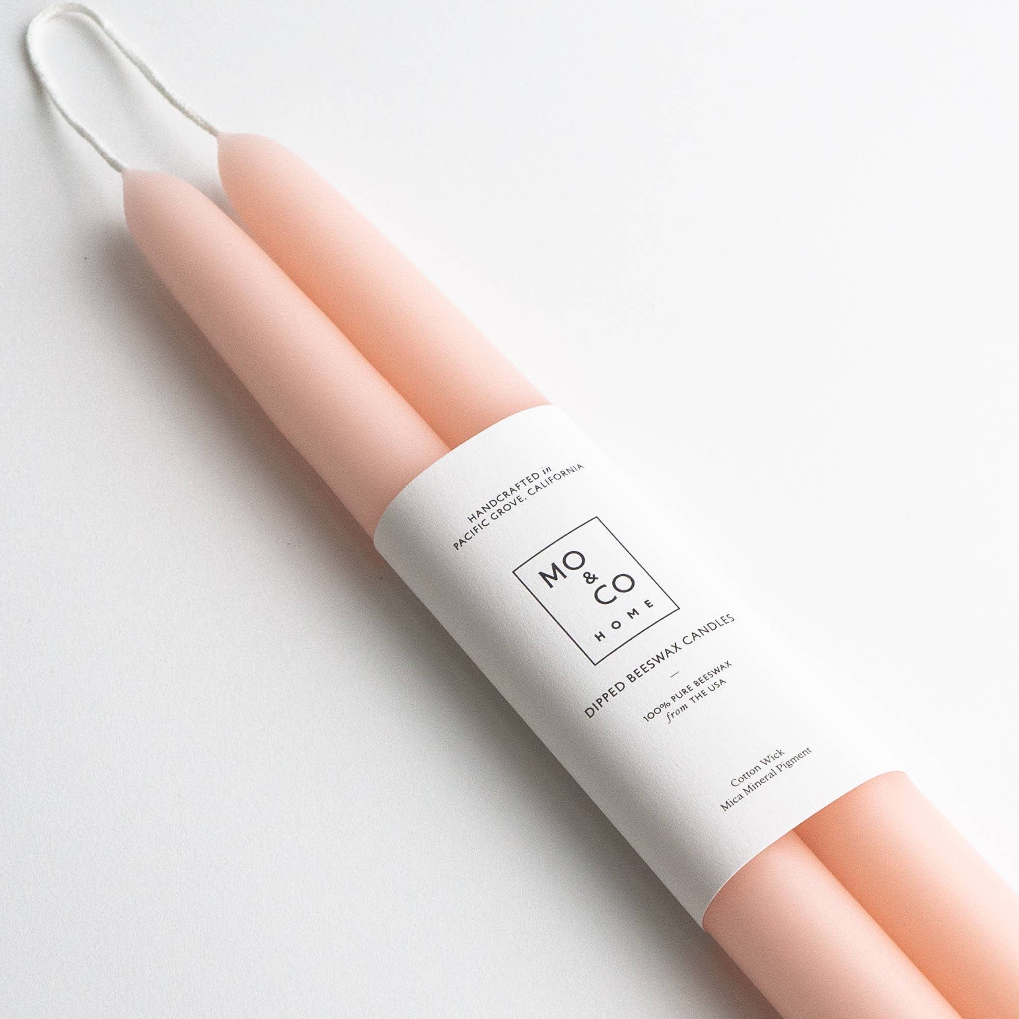 100% Beeswax 14" Dipped Candles | Pink Rose (Set of 2) 100% Beeswax 14" Dipped Candles | Pink Rose (Set of 2) - Handcrafted Beeswax Dipped Candles. Sold as a pair. Enjoy the beautiful colors of spring with these handmade candles for home, party, or weddings. Each candle is dipped over 25 times by hand. Ingredients: 100% Beeswax from the USA Cotton Wick Eco-Conscious Coloring Why beeswax? -When burned, beeswax candles emit negative ions that purify the air making it the cleanest burning wax available. -When you purchase beeswax products, you are supporting the bee farmers who colonize and encourage bee reproduction. -Beeswax naturally smells like honey and wildflowers! Made in Pacific Grove, California