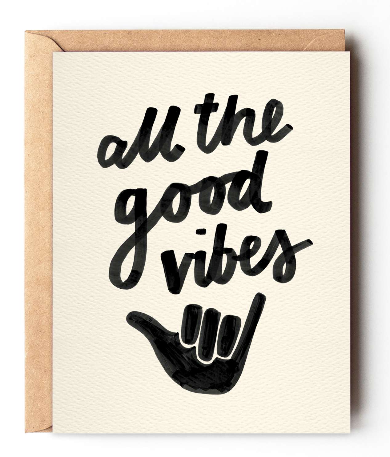 All The Good Vibes - Uplifting Shaka Everyday Card - A fun, uplifting card featuring hand drawn font and shaka. Send some beach vibes with this versatile everyday card.  -Size: 4.25&quot; x 5.5&quot; -Digital print on a quality, felt textured card  -100% recycled envelope  -Packed in an eco-friendly biodegradable clear sleeve 