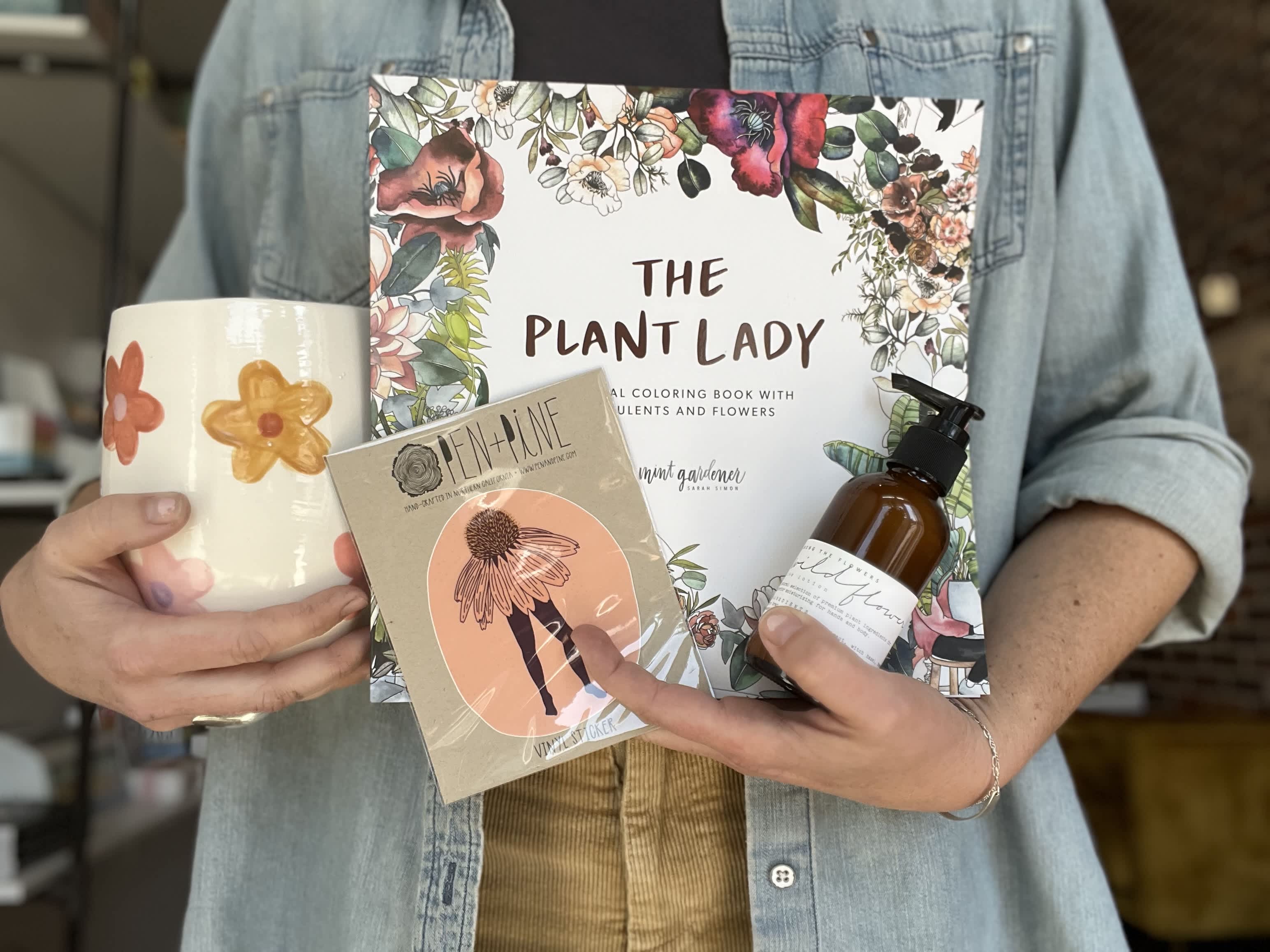 The Plant Lover Gift Set - Gift your nature loving friend our eco-conscious gift set featuring: - Local and Handmade Pottery - Plant Lover Coloring Book - Organic Botanical Aloe Wildflower Lotion (4oz) - Hand drawn floral sticker 