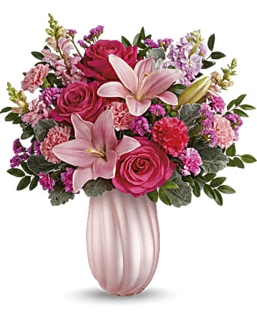 Rosy Swirls Bouquet - Capture Mom's heart with our pearlescent Teleflora's Rosy Swirls vase, radiating elegance and charm, paired with a bouquet of pink roses and lavender blooms, a delightful Mother's Day surprise she'll cherish.
