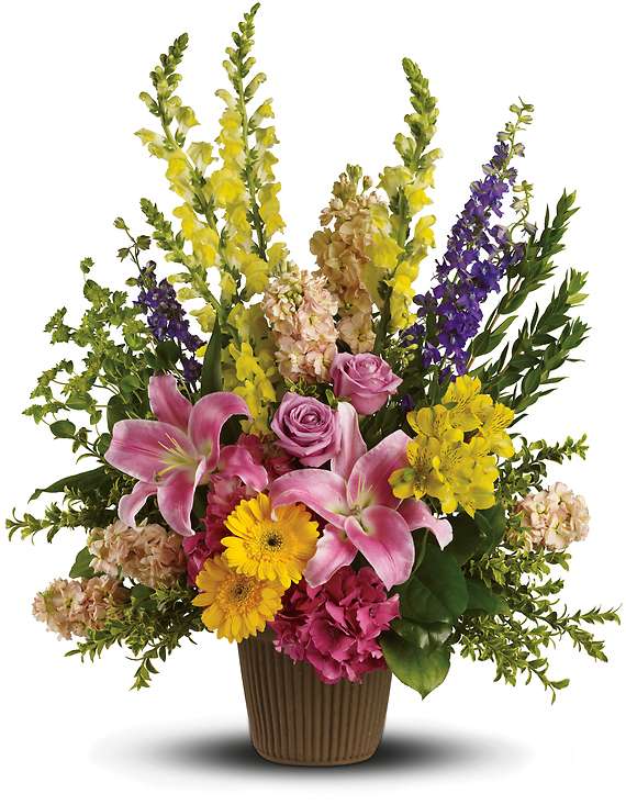 GLORIOUS GRACE BOUQUET GLORIOUS GRACE BOUQUET - his gorgeous array of roses, lilies and other favorites is a beautiful tribute to the spirit of a loved one who is no longer with us. The magnificent bouquet includes pink hydrangea, lavender roses, pink oriental lilies, yellow gerberas, yellow alstroemeria, yellow snapdragons, purple larkspur and peach stock, accented with assorted greenery.