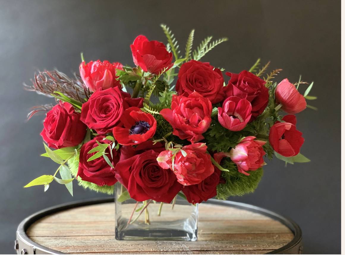 Modern Valentine  - Modern Valentine    In some instances, our photo may represent an overall theme or look and include a one-of-a-kind vase which cannot be exactly replicated.  Although the actual bouquet may not precisely match the photo, its temperament will. Occasionally, substitutions of flowers and/or containers happen due to weather, seasonality and market conditions which may affect availability. If this is the case with the gift you’ve selected, we will ensure that the style, theme and color scheme of your arrangement is preserved and will only substitute items of equal value or higher value.  DELIVERY TIMES ARE USUALLY BETWEEN 2:30 PM THROUGH 6:30PM ON THE DAY OF DELIVERY. FOR SAME DAY ORDERS, PLEASE GIVE US AT LEAST 6 HOURS TO PROCESS AND DELIVER THE FLOWERS AS PRIOR ORDERS WILL BE PRIORITIZED. MORNING DELIVERY REQUESTS AND SPECIFIC TIME REQUESTS WILL BE AN ADDITIONAL $15 FOR A CONVENIENCE FEE CHARGE. OTHERWISE, SPECIFIC TIMES ARE ACKNOWLEDGED AND WE WILL DO OUR BEST TO ACCOMMODATE, HOWEVER WE CANNOT GUARANTEE ON TIME DELIVERY. GATE CODES ARE MANDATORY FOR OUR DELIVERY DRIVERS TO BE ABLE TO ENTER RESIDENTIAL OR COMMERCIAL BUILDINGS. IF YOU DON’T KNOW THE GATE CODE FOR A DELIVERY, PLEASE CONTACT THE RECIPIENT AND PROVIDE US WITH IT OR OUR DRIVER CAN CONTACT THE RECIPIENT BEFORE BEGINNING A DELIVERY ROUTE TO OBTAIN THE CODE. OUR POLICY STATES THAT DRIVERS WILL ONLY WAIT FIVE MINUTES OUTSIDE THE GATE FOR A CALLBACK. IF A DRIVER HAS TO LEAVE A PROPERTY, THE DELIVERY IS REASSIGNED FOR THE NEXT DAY AND MAY CHARGE AN ADDITIONAL DELIVERY FEE. THANK YOU FOR YOUR BUSINESS.