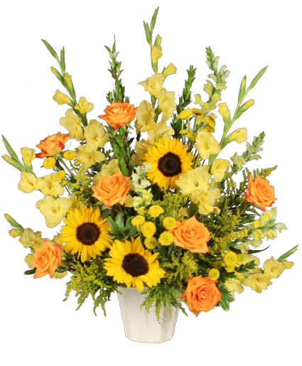 Golden Goodbye - Comfort often can revolve around beautiful memories and a place of tranquility. Like taking in the beauty of a warm and green spring field on a summer day, the Golden Goodbye arrangement can be a way to offer peace to the ones you love.