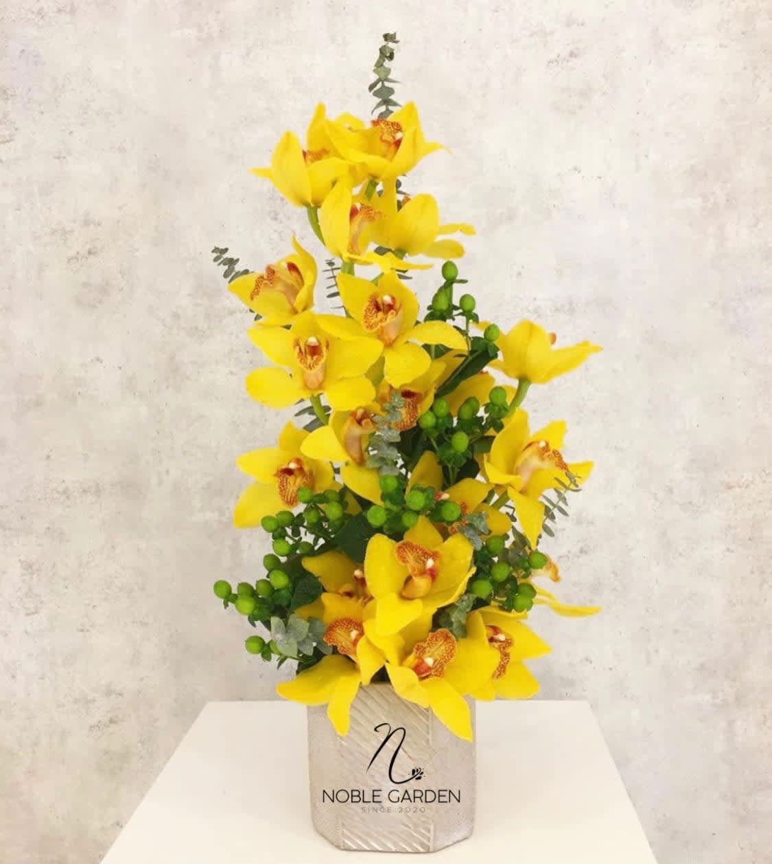 Yellow Cymbidium orchid - Standard- Your order will be arranged approximately as shown on our website.