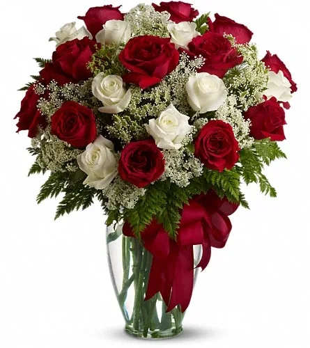 Wonder Wishes - A very elegant display of roses in a clear vase to show you care.