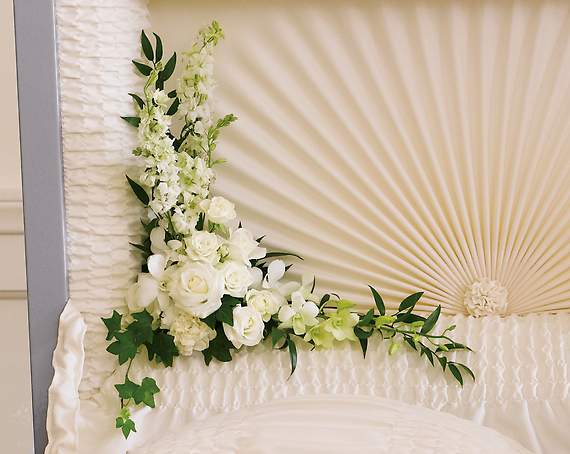 MOONLIT WALK MOONLIT WALK - Designed for inside the casket, this gorgeous array of white orchids, white roses and other white flowers is a fitting, and very personal tribute.