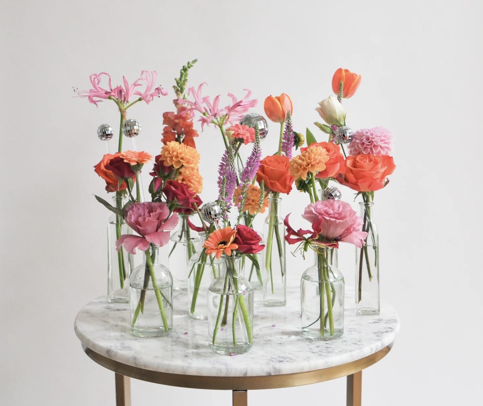 10 Bud Vases - These 10 little bud vases are a fun way to sprinkle happy party vibes throughout your home or event.  