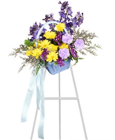 Blessed Blue Spray - Bless the ones you love and let them know you're there for them during this difficult time. With blue delphinium, yellow daisy poms, lavender carnations, and more, Blessed Blue Spray is a delicate and tasteful mix. Send them love and show them how much you care with this beautiful arrangement.