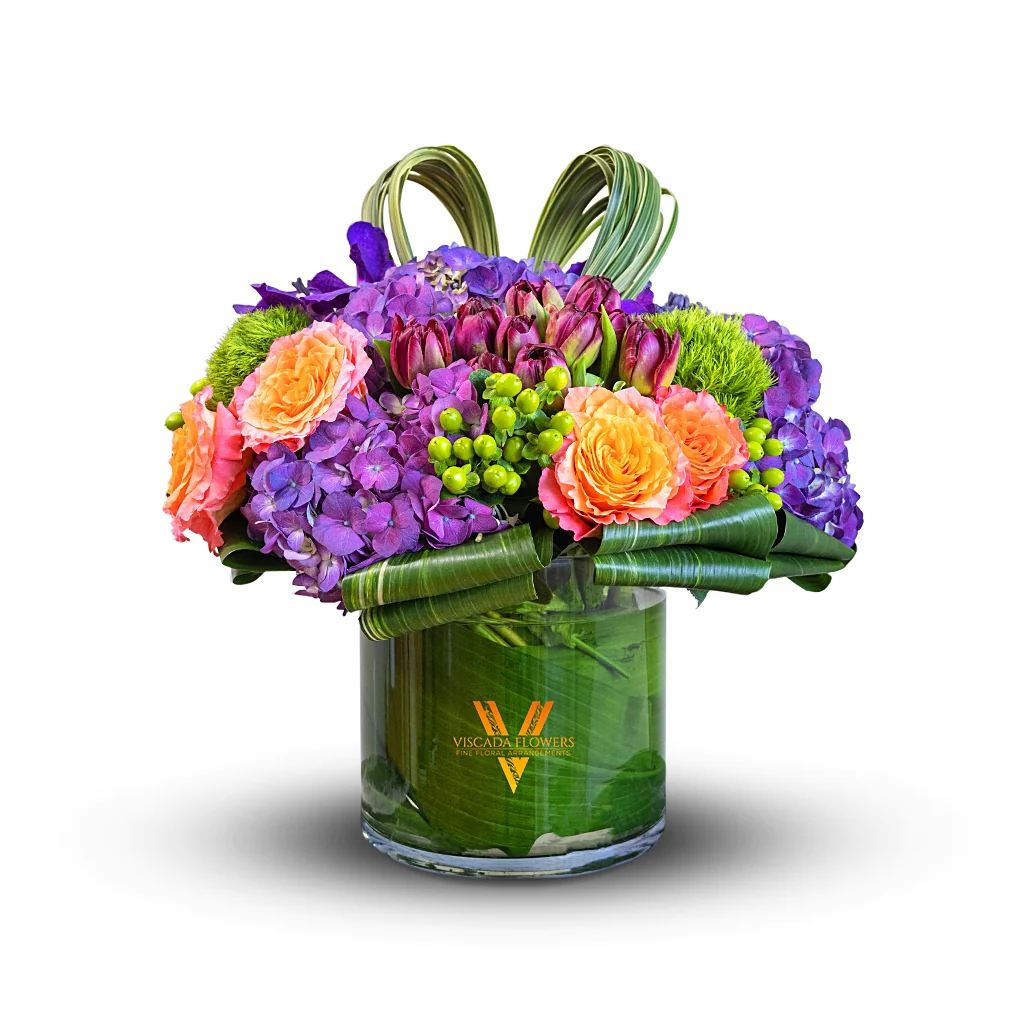 French Violet - Elegant and timeless, this bouquet features purple hydrangeas, muscari flowers, and Cabernet tulips. With its graceful blooms and exquisite colors, French Violet adds a touch of refined beauty and sophistication to any space, creating an enchanting ambiance that captivates the senses.